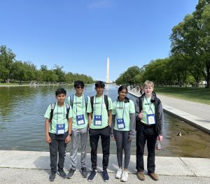 Students standing in front of a Washington D.C. monument