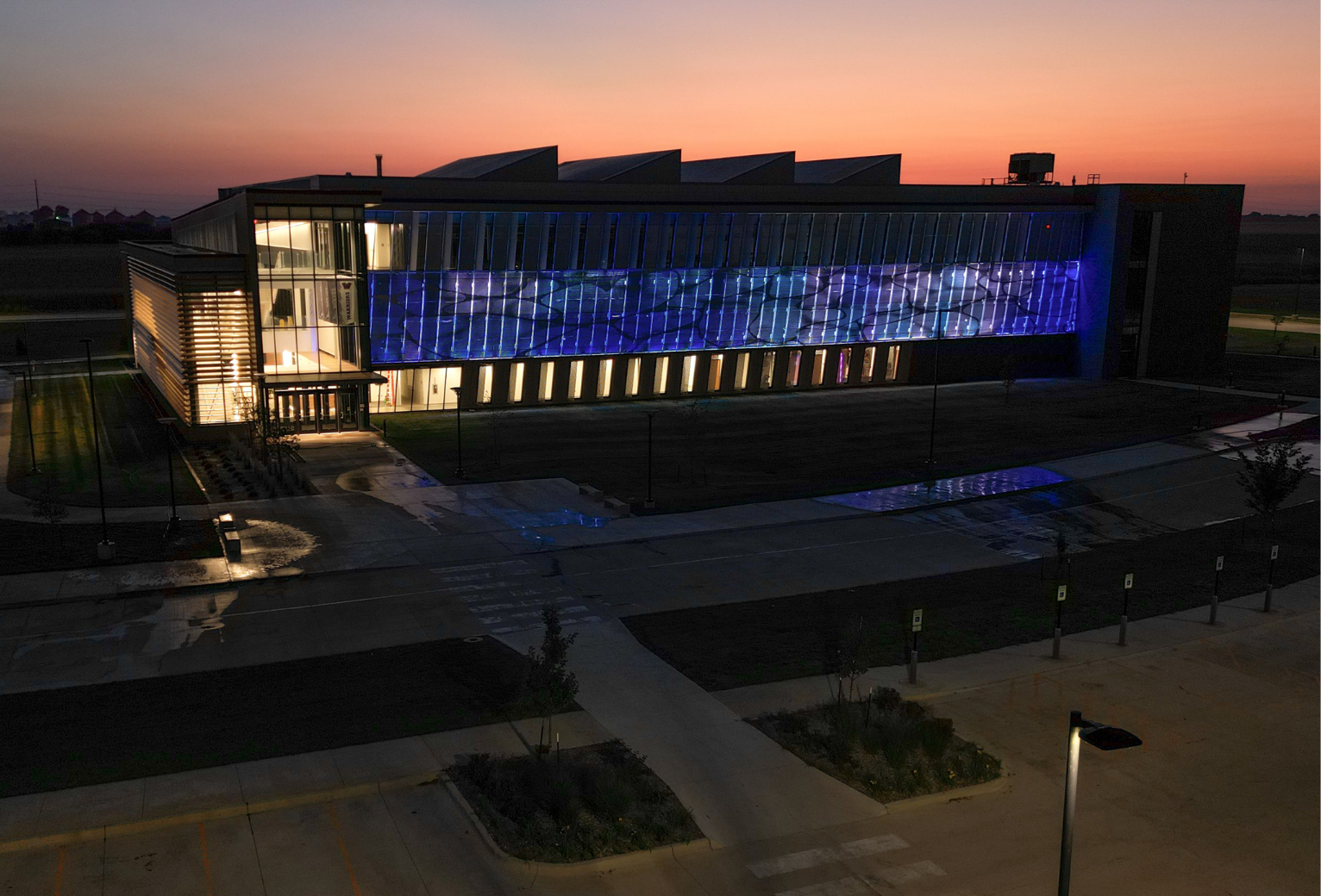 View of the natatorium at sunset.