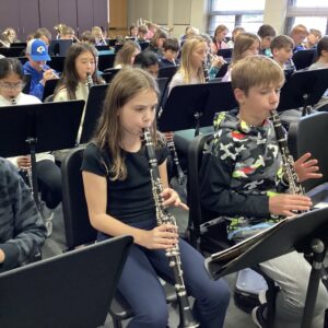 5th grade band students in band class.