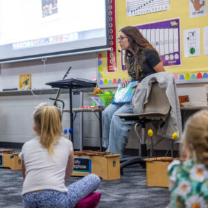 Teacher having a music lesson.