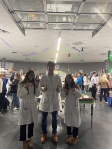 APEX Research associates stand in research lab